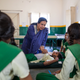 Students learn first aid care from health center teacher Aleyamma Joseph.